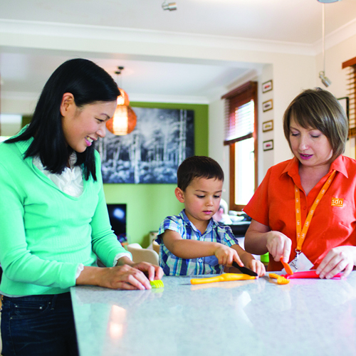 Parent and child with child care worker