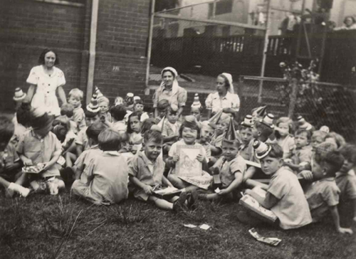 Outdoor party at Newtown Day Nursery and Nursery School, c. 1944